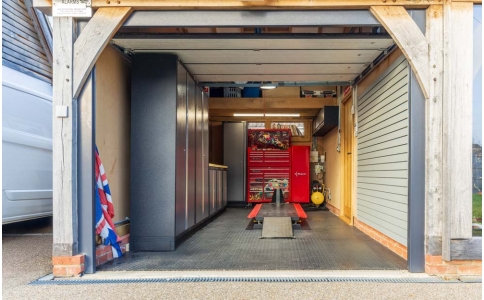 Motorbike workshop with Sealey superline pro storage cabinets